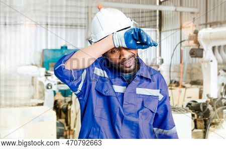 African American Black Male Worker Engineer Working In Electric Robotic Welding Factory Where Swelte