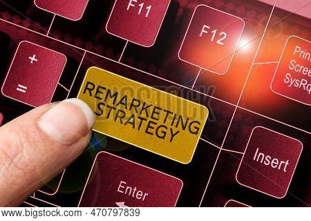 Hand Writing Sign Remarketing Strategy. Word Written On Re-engage Customers Using Information Collec