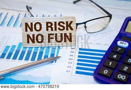 The Inscription No Risk No Fun On The Background Of Economic Graphs.