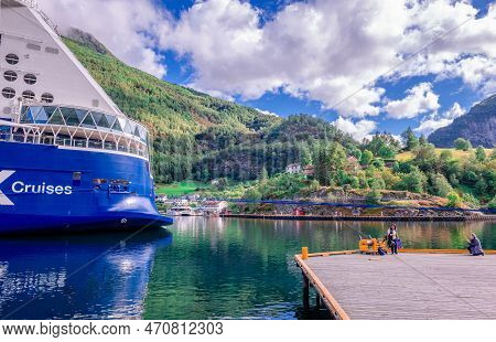 Flam, Norway, August 17 2022: The Stern Of A Cruise Ship At The Inner End Of Aurlandsfjord, With The