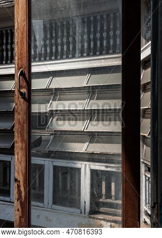 View Through An The Old Window Of Ancient Old Building Onto Antique Steel Awning Windows The Other S