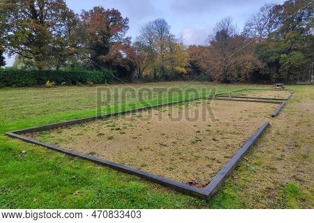 Two Petanque Pitchs In A Park In Brittany.