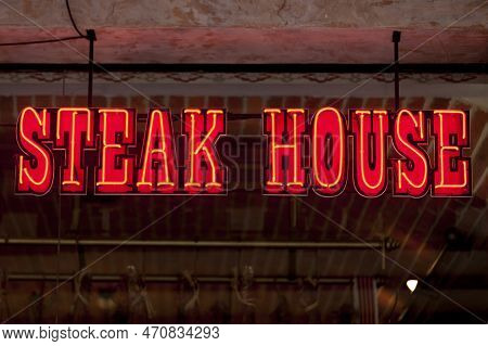 Red Neon Light Shaped Into The Words 