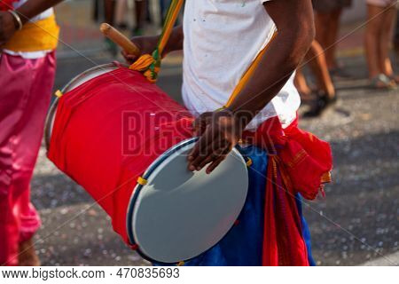 Musician Playing With A Dholak During The Carnival Of Grand Boucan.