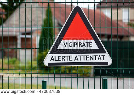 Triangular Sign Attached To A School Fence For The Vigipirate Plan, The France's National Security A