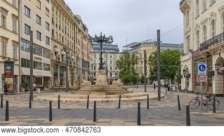 Budapest, Hungary - July 31, 2022: Lion Fountain Landmark At Vorosmarty Square Summer Day City Centr