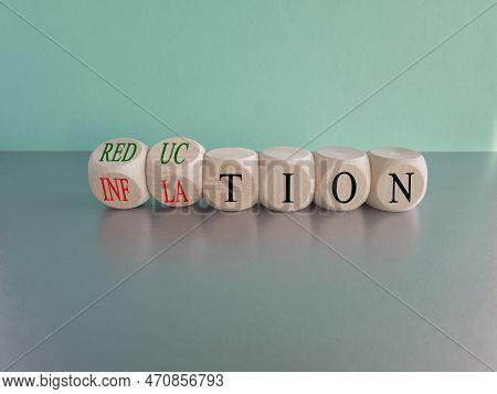 Inflation Or Reduction Symbol. Concept Word Inflation Reduction On Wooden Cubes.  Beautiful Grey Tab