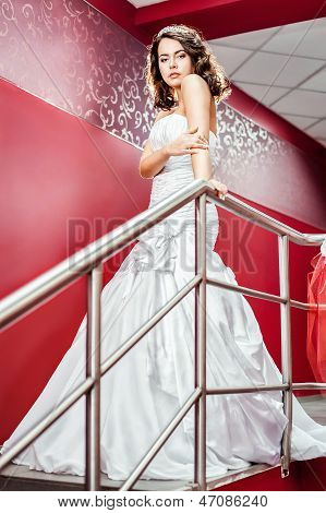 the bride in a long white wedding dress