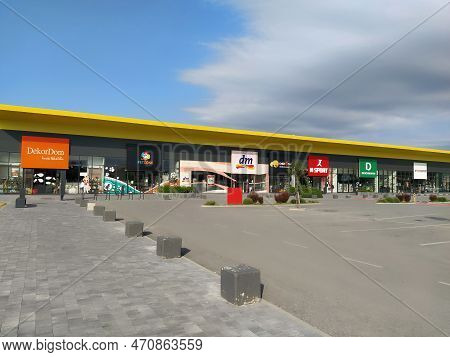 Stop Shop Shopping Center, Sremska Mitrovica, Serbia, June 06, 2022. Square With Open Shops Dm, Inte