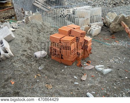 Building Blocks On The Ground. Material For The Construction Of Warm Houses. Progress. Construction 