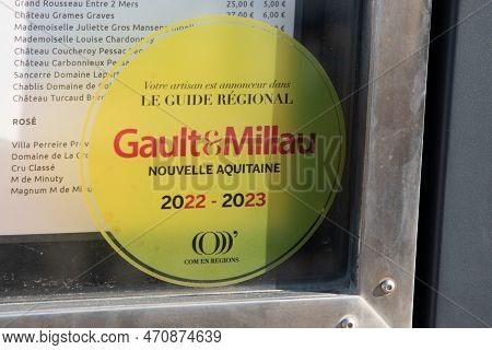 Bordeaux , Aquitaine  France - 12 02 2023 : Gault & Millau Logo Brand And Text Sign Yellow Nameplate