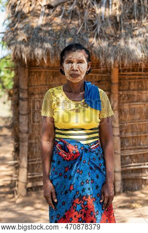 Belo Sur Tsiribihina, Madagascar - November 4. 2022: Malagasy Woman In Front Of Her Hut With A Tradi