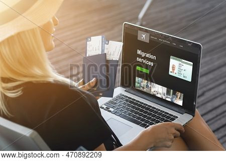 Woman Fills Out Application To Consular Section Of Embassy To Obtain Visa Online.