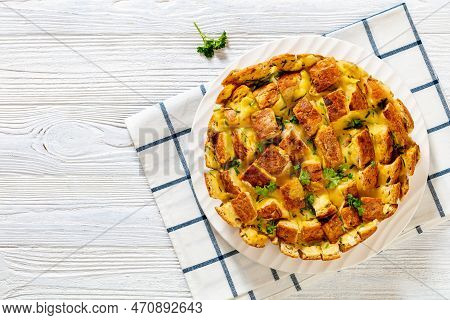 Cheesy Garlic Bread, Pull Apart Whole Round Bread On Platter On White Wood Table , Flat Lay, Copy Sp
