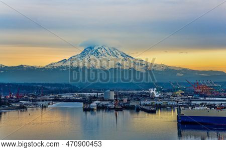 A View Of The Port Of Tacoma With Overcast Sky At Twilight.