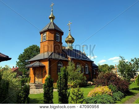 Picturesque Wooden Orthodox Church In The Village Kostomloty In Eastern Poland
