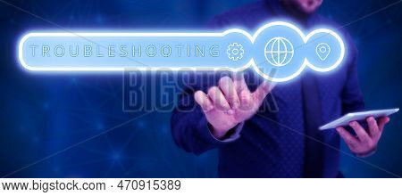 Hand Writing Sign Troubleshooting. Word Written On An Act Of Investigating Or Dealing With In The Pr