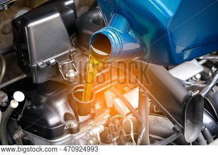Refueling And Pouring Oil Quality Into The Engine Motor Car Transmission And Maintenance Gear .energ