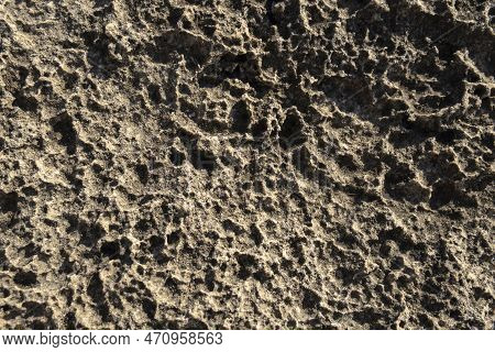 Close-up Of The Texture Of The Coastal Rock Of The Island Of Mallorca At Sunrise