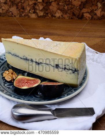 French Semi-soft Cow Milk Cheese Morbier From Franche-comte Region With Thin Black Layer And Strong