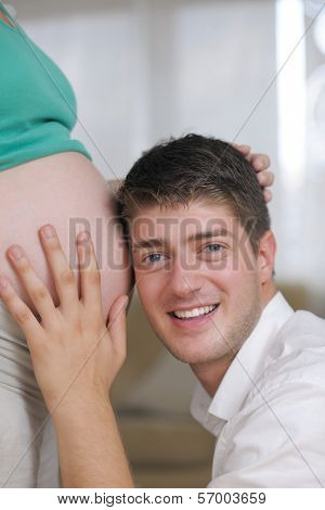 happy young cuple, pregnant woman