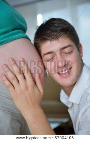 happy young cuple, pregnant woman