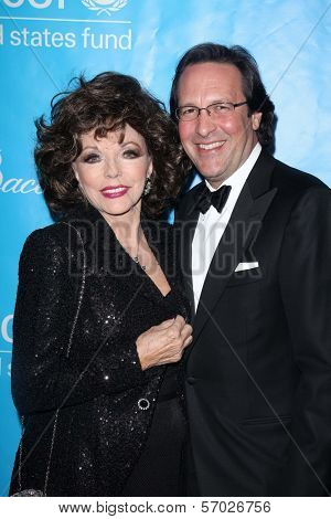 Joan Collins and Percy Gibson at the 2011 Unicef Ball, Beverly Wilshire Hotel, Beverly Hills, CA 12-08-11