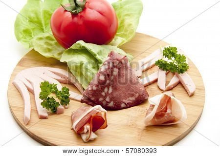 Fresh Raw and Cooked Ham with Cold Cuts from Blood Sausage