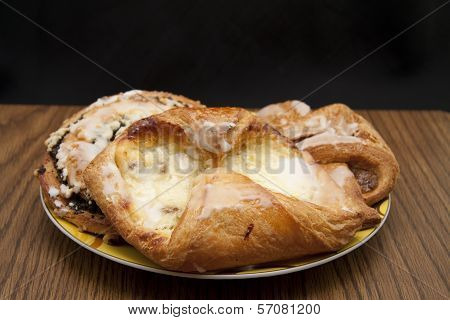 Fresh Baked Pastries on Ceramic Plate