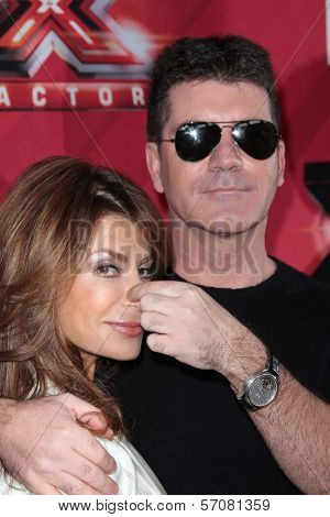 Paula Abdul and Simon Cowell at 
