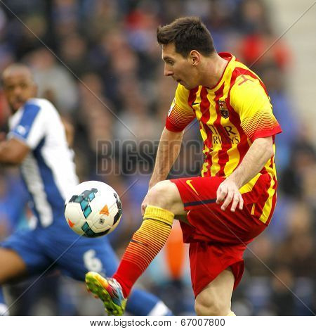 BARCELONA - MARCH, 29: Leo Messi of FC Barcelona in action during a Spanish League match against RCD Espanyol at the Estadi Cornella on March 29, 2014 in Barcelona, Spain