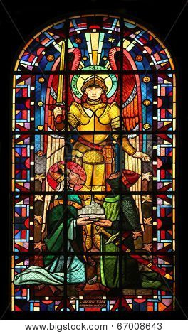 PARIS,FRANCE NOV 07: Saint Michael, Notre-Dame de Clignancourt church located in the 18th arrondissement of Paris. Completed in 1863. Windows are from the Art Deco period. On Nov 07 in Paris