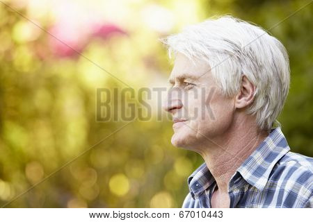Senior man in garden