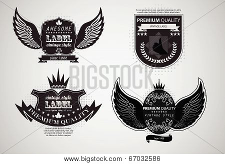 Collection of vintage labels with wings: the premium quality and warranty