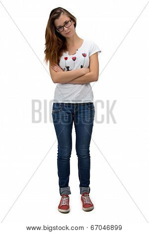 Teenager girl with glasses and arms crossed