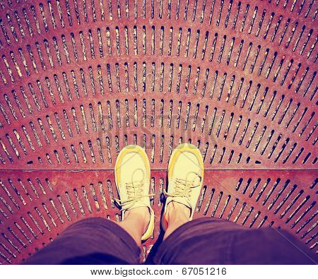  a shot of yellow and white boat or deck shoes done with a retro vintage instagram filter