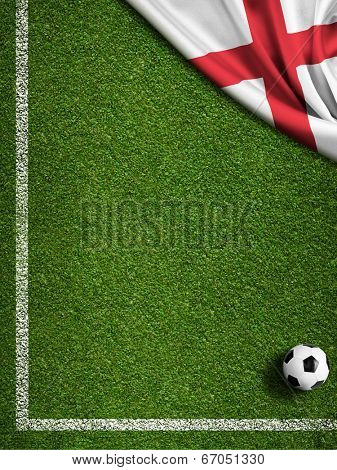 Soccer field with ball and flag of England