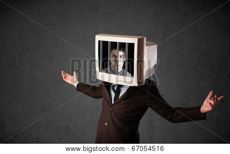 Business man with monitor screen on his head traped into a digital system concept