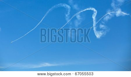 BERLIN, GERMANY - MAY 21, 2014: Aerobatic team 3x Fly Sinthesis Texan Top Class (Wefly team, Italy) demonstration during the International Aerospace Exhibition ILA Berlin Air Show-2014.