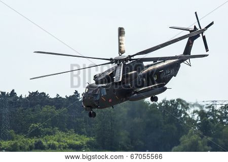 BERLIN, GERMANY - MAY 21, 2014: Sikorsky CH-53 Sea Stallion is the heavy-lift transport helicopter, demonstration during the International Aerospace Exhibition ILA Berlin Air Show. 