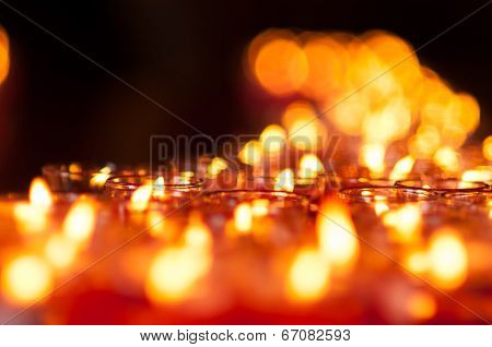 Church Candles In Red Transparent Chandeliers
