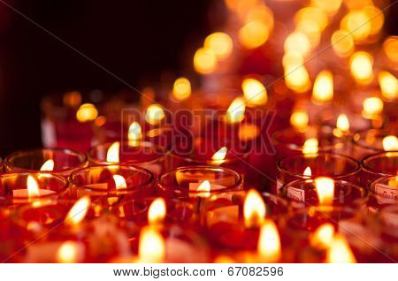 Church Candles In Red Transparent Chandeliers
