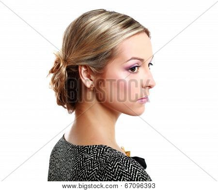 Portrait of young woman with creative elegant hairstyle