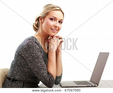 young woman with a laptop sitting