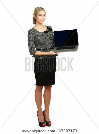Young beautiful woman showing a laptop
