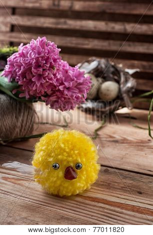 nest with  quail eggs and chick
