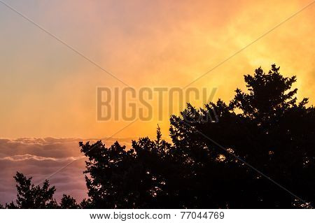 Sunrise Above The Clouds