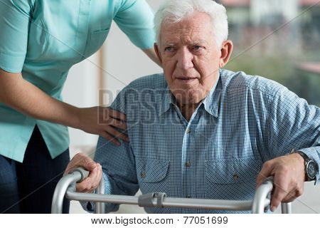 Handicapped Man Using Walker