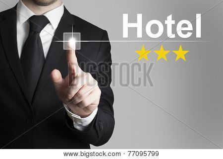 Businessman Pushing Button Hotel Three Stars