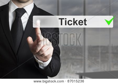 Businessman Pushing Button Ticket